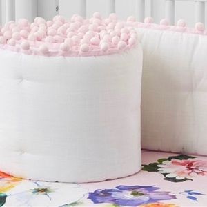 Pottery barn pre-loved bumper for crib.